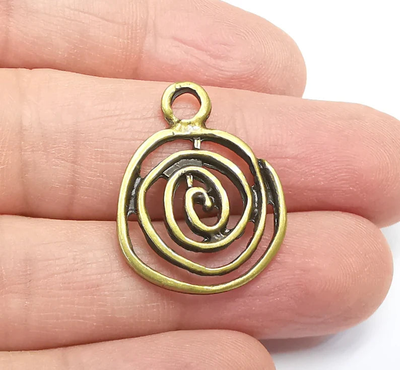 2 Swirl Charms Antique Bronze Plated (27x22mm) G29666