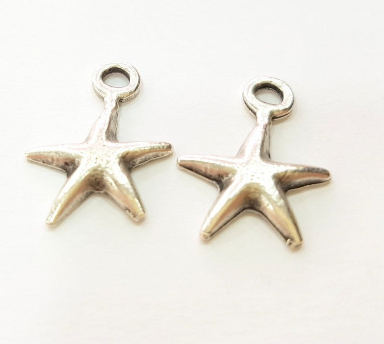 4 Silver Charms Antique Silver Plated Star Charms (23x17mm)  G14382