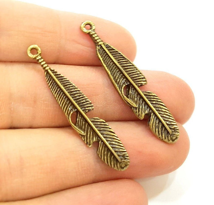 10 Antique Bronze Feather Charm (42x8mm) G7165