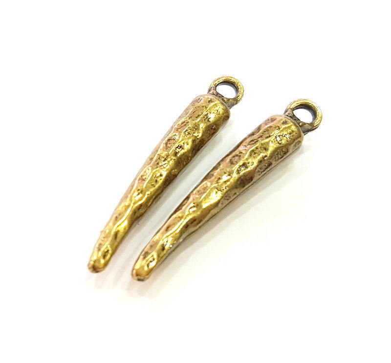 4 Antique Bronze Charms (36x6mm) G7253