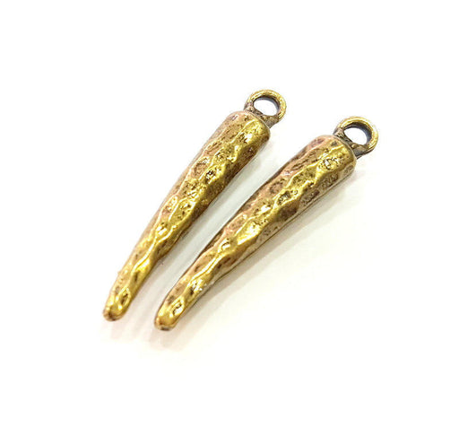 4 Antique Bronze Charms (36x6mm) G7253