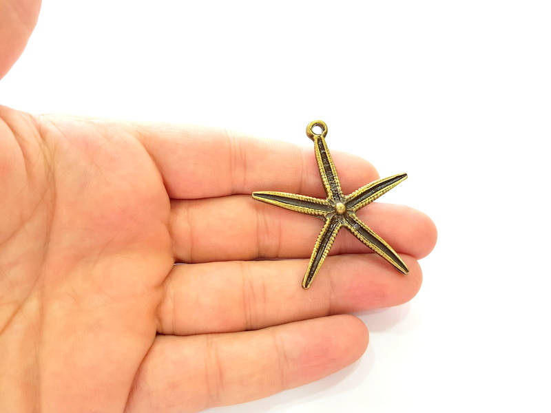 Antique Bronze Star Pendant (52x48mm) G8180