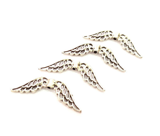 4 Silver Wing Charms Antique Silver Plated Charms (42x8mm) G8229