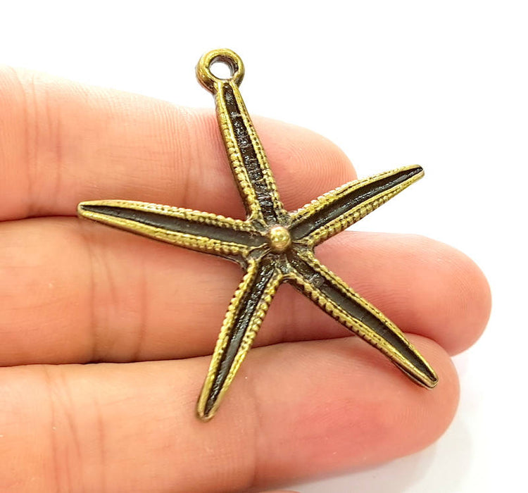 Antique Bronze Star Pendant (52x48mm) G8180