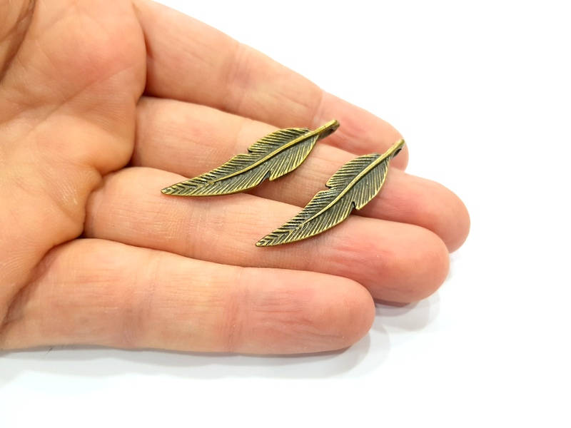 4 Feather Charm Antique Bronze Charm Antique Bronze Plated Metal (43x10mm) G10565