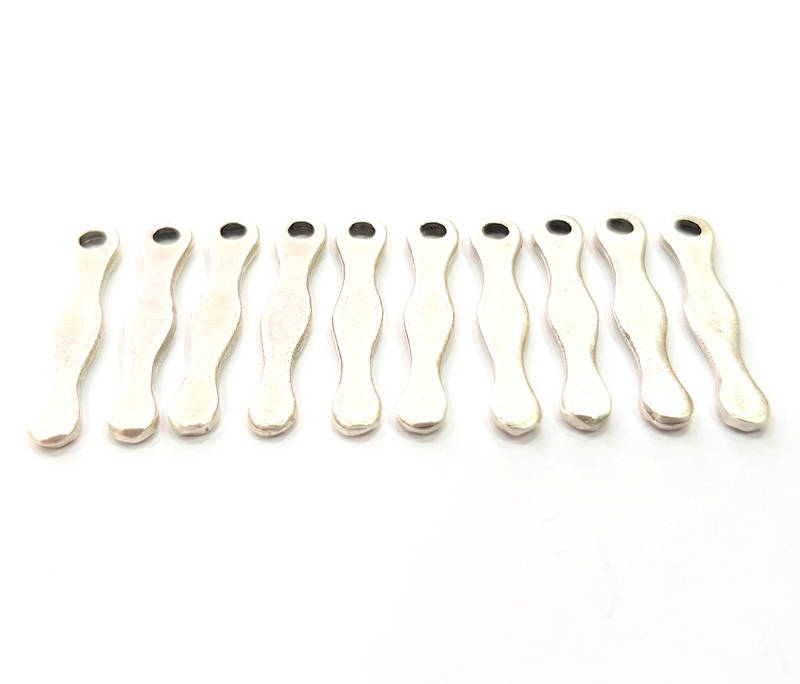 10 Silver Charms Antique Silver Plated Metal (25x5mm) G11397