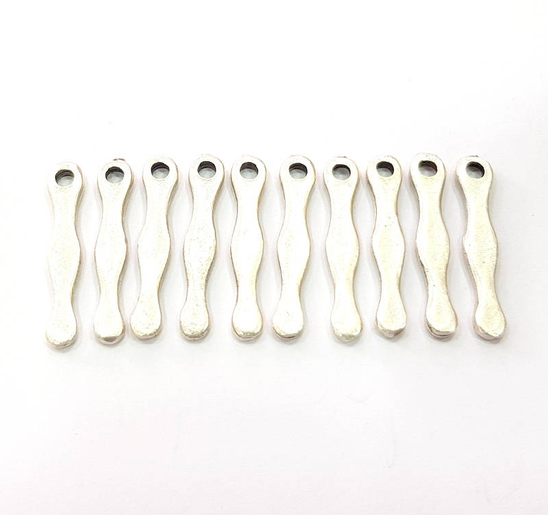 10 Silver Charms Antique Silver Plated Metal (25x5mm) G11397