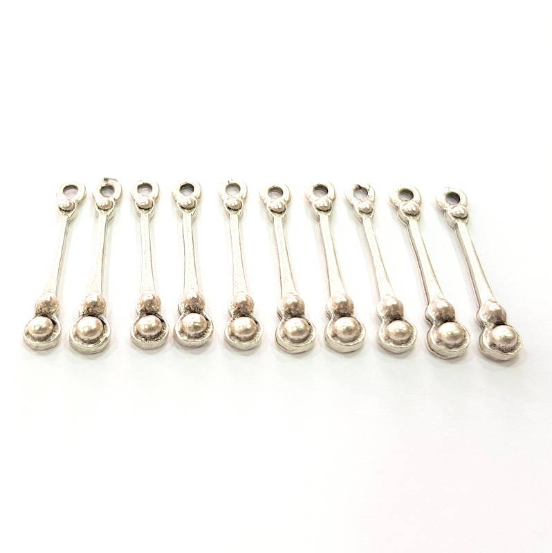 20 Silver Charms Antique Silver Plated Metal (25x4mm) G11388