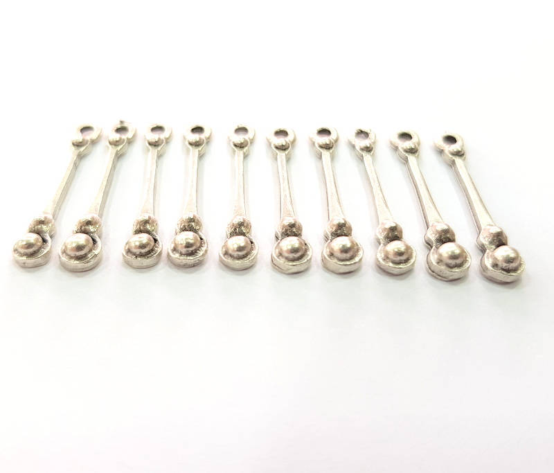 20 Silver Charms Antique Silver Plated Metal (25x4mm) G11388
