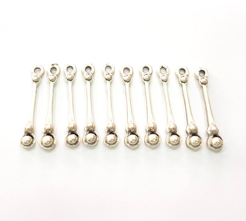 20 Silver Charms Antique Silver Plated Metal (25x4mm) G11388