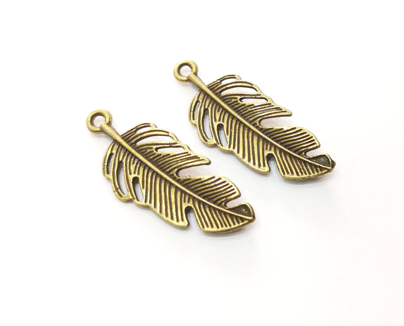 4 Feather Charms Antique Bronze Plated Charms (39x15mm)  G18530