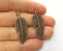 4 Feather Charms Antique Copper Plated Charms (39x15mm)  G18671