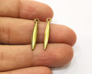 20  Spike Charm Antique Bronze Plated Charms (25x4 mm)  G19330