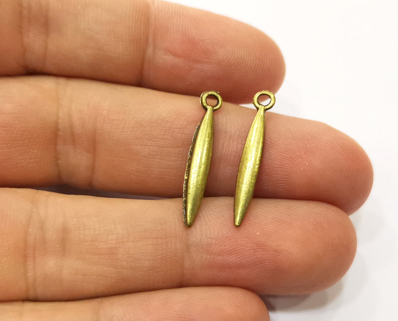 20  Spike Charm Antique Bronze Plated Charms (25x4 mm)  G19330
