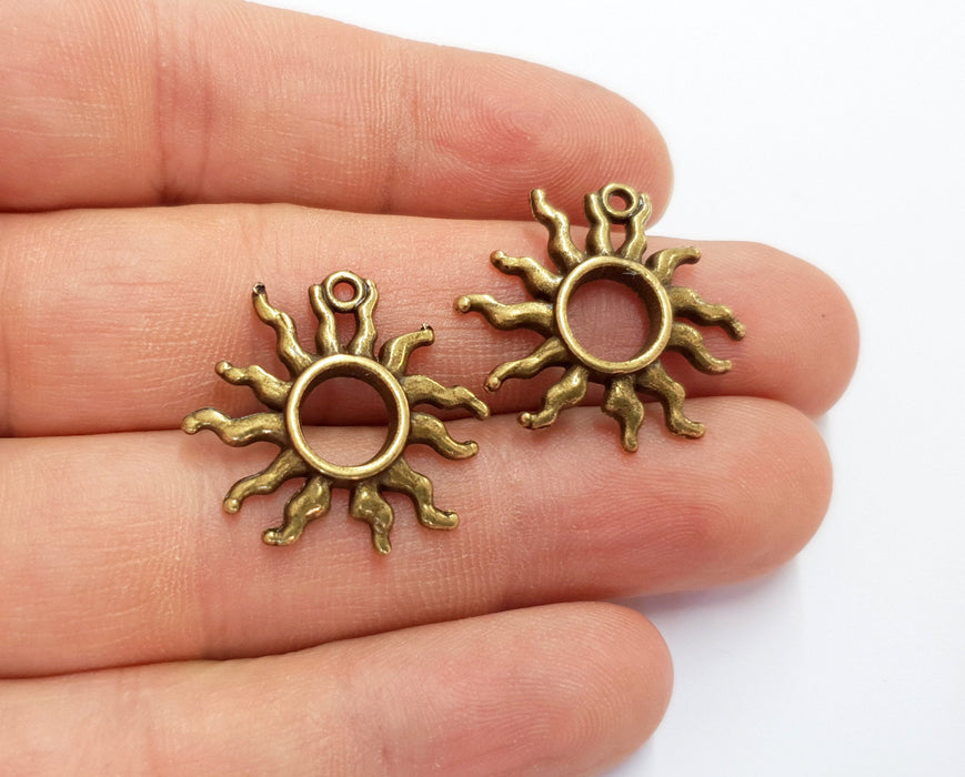 4 Sun Charms Antique Bronze Plated Charms (24x26mm) G19743