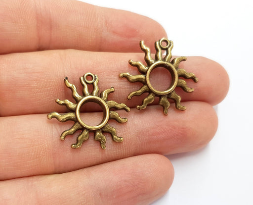 4 Sun Charms Antique Bronze Plated Charms (24x26mm) G19743