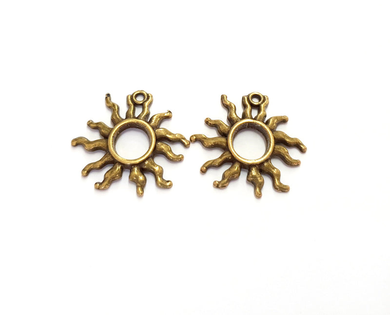 4 Sun Charms Antique Bronze Plated Charms (24x26mm) G19743