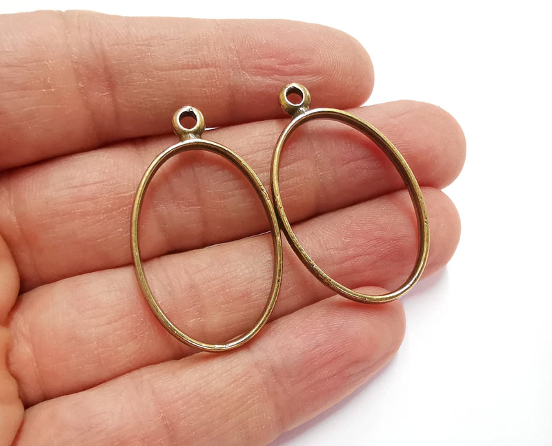 4 Oval Bezel Charms Antique Bronze Plated Charms (39x23mm) G21188