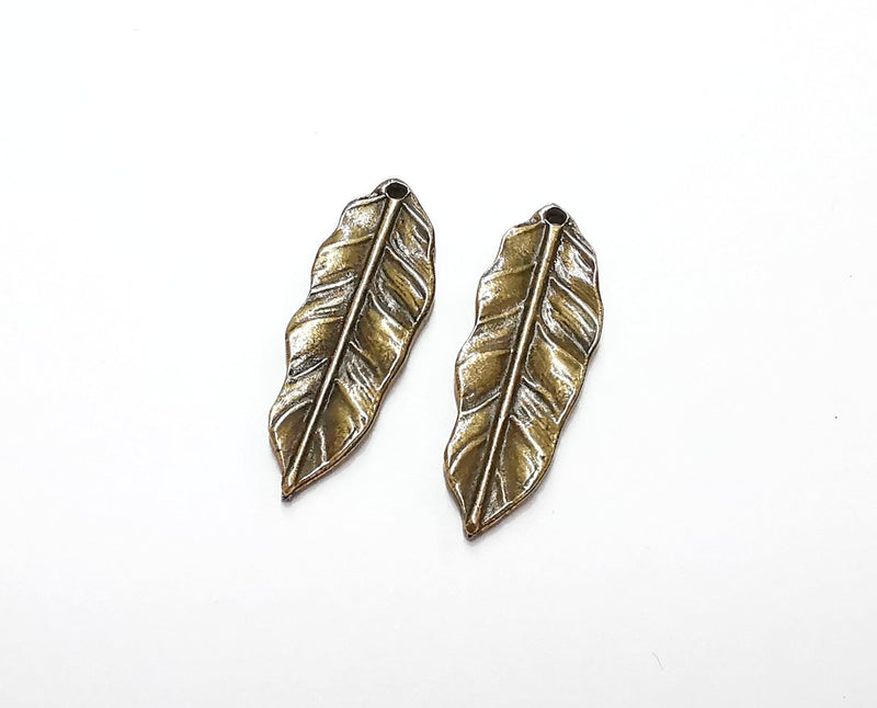 4 Leaf Charm Antique Bronze Plated Charm (34x12mm) G21241