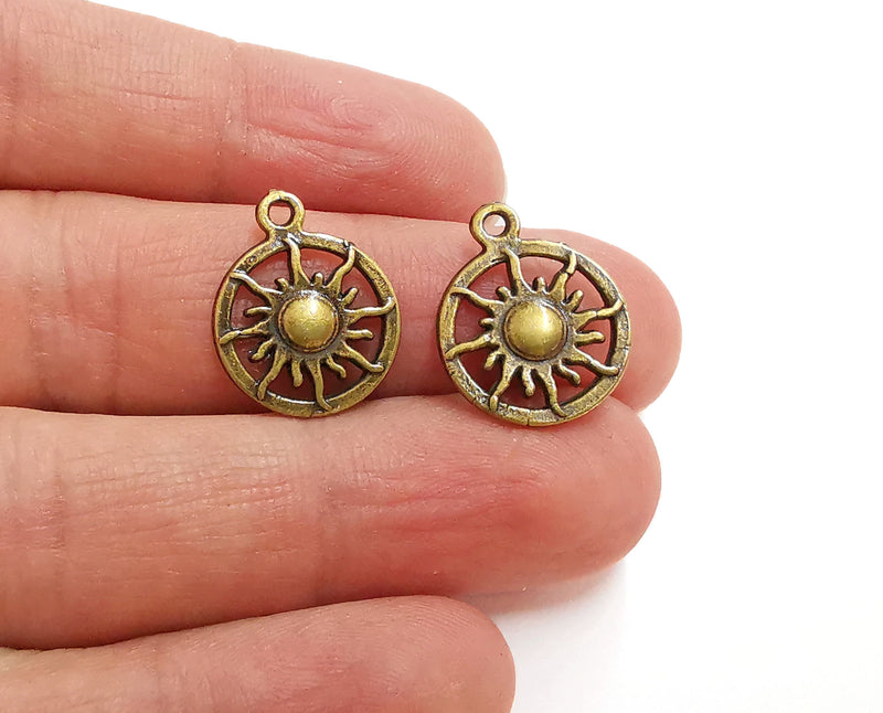 10 Sun Charms Antique Bronze Plated Charms (20x16mm)  G21423