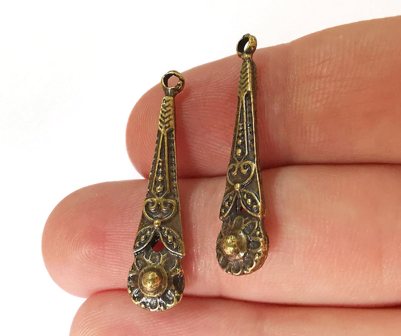 4 Antique Bronze Charms (Double Sided) Antique Bronze Plated Charms (34x8mm)  G17430