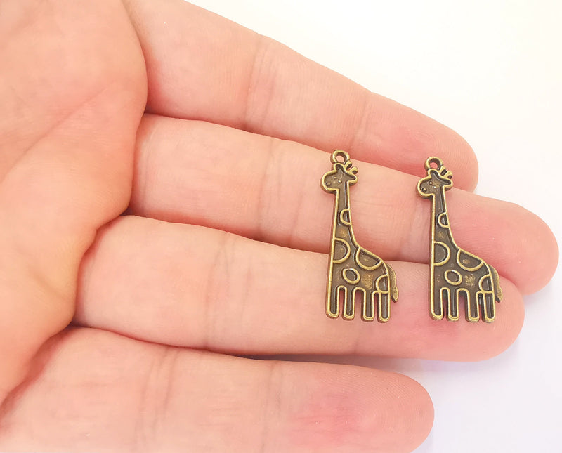 4 Giraffe Charms Antique Bronze Plated Charms (31x12mm)  G22791