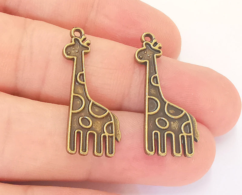 4 Giraffe Charms Antique Bronze Plated Charms (31x12mm)  G22791