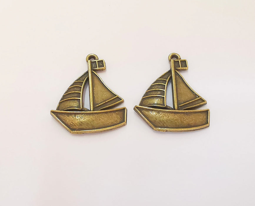 4 Sailing Ship Charms Antique Bronze Plated Charms (31x25mm)  G23319