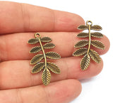 2 Leaf charms Antique bronze plated charms (38x21mm)  G23389