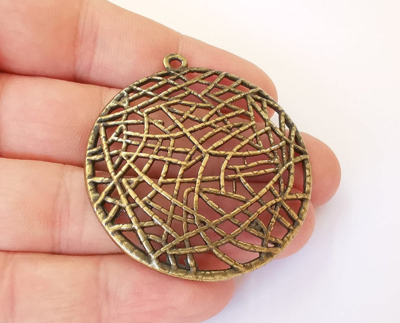 2 Antique bronze curved charms Antique bronze plated charms (52x48mm) G23445