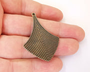 2 Antique bronze charms Antique bronze plated charms (47x35mm)  G23479