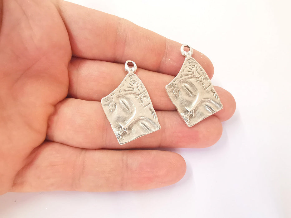 4 Antique silver face charms Silver plated charms (35x21mm)  G23491