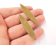 2 Antique bronze Oval charms Antique bronze plated brass (55x12mm) G23496