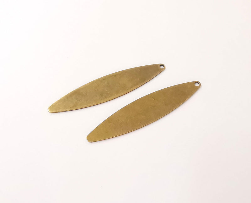 2 Antique bronze Oval charms Antique bronze plated brass (55x12mm) G23496