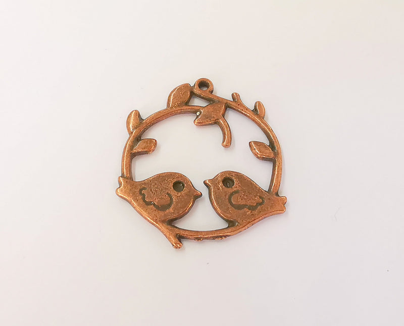 2 Bird, Leaf and Branch charms Antique copper plated charms (42x36mm) G23578