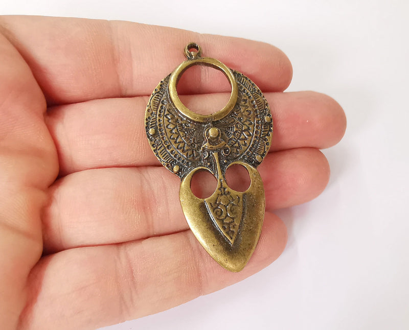 2 Antique bronze charms Antique bronze plated charms (61x33mm) G23638