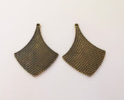 2 Antique bronze charms Antique bronze plated charms (47x35mm)  G23479