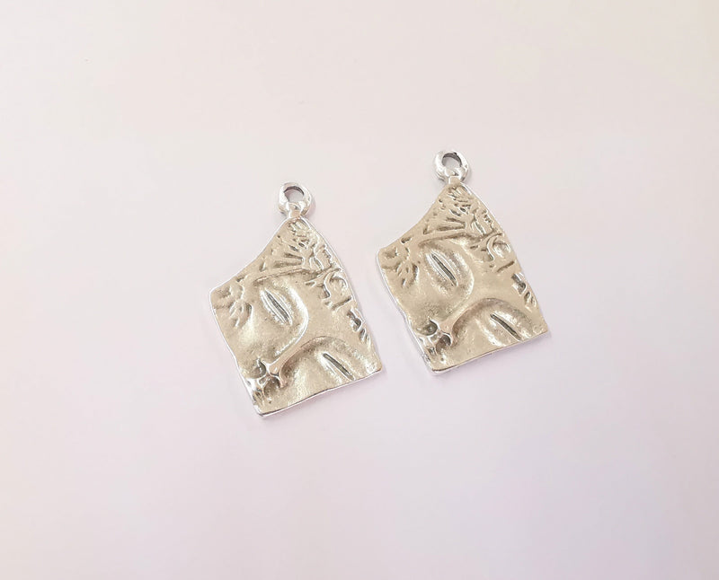 4 Antique silver face charms Silver plated charms (35x21mm)  G23491