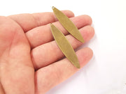 2 Antique bronze Oval charms Antique bronze plated brass (55x12mm) G23496