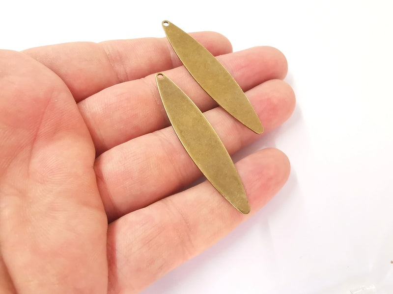 2 Antique bronze Oval charms Antique bronze plated brass (55x12mm) G23496