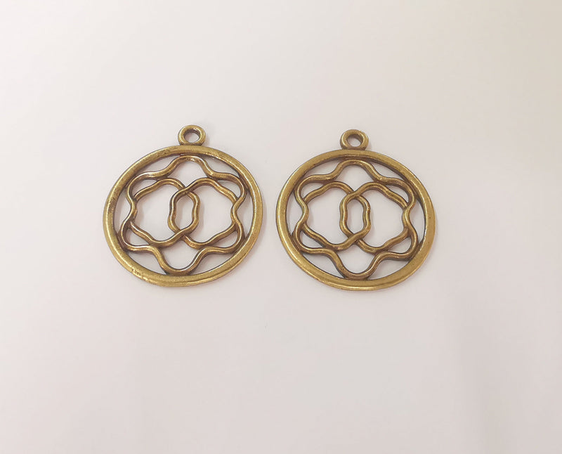 2 Antique bronze charms Antique bronze plated charms (40x34mm)  G23851
