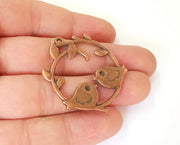 2 Bird, Leaf and Branch charms Antique copper plated charms (42x36mm) G23578