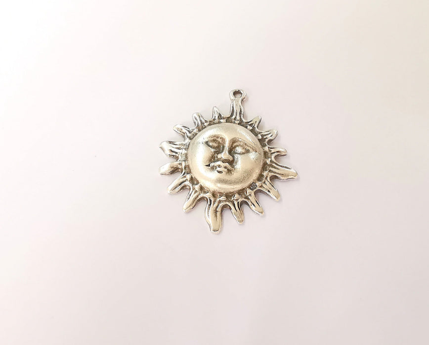 2 Sun charms Antique silver plated charms (47x37mm) G23643