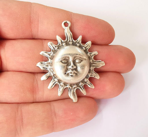 2 Sun charms Antique silver plated charms (47x37mm) G23643