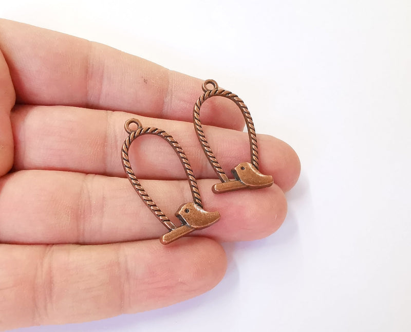 4 Bird charms Antique copper plated charms (36x17mm) G23918