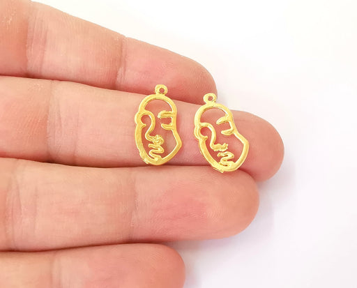4 Face Charms Gold plated brass charms (19x11mm)  G23812