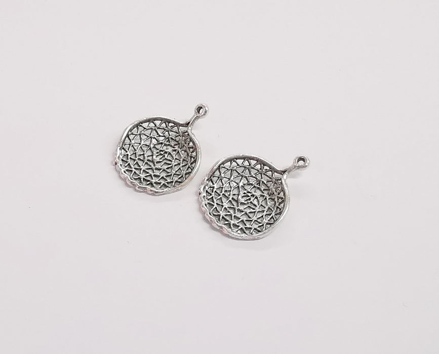 4 Circle charms with authentic motifs Antique silver plated brass charms (25x19mm)  G24093