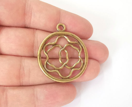 2 Antique bronze charms Antique bronze plated charms (40x34mm)  G23851