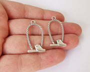 4 Bird charms Antique silver plated charms (36x17mm) G23861