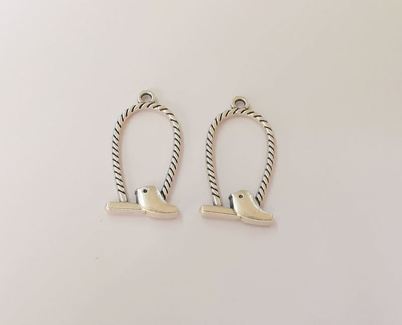 4 Bird charms Antique silver plated charms (36x17mm) G23861